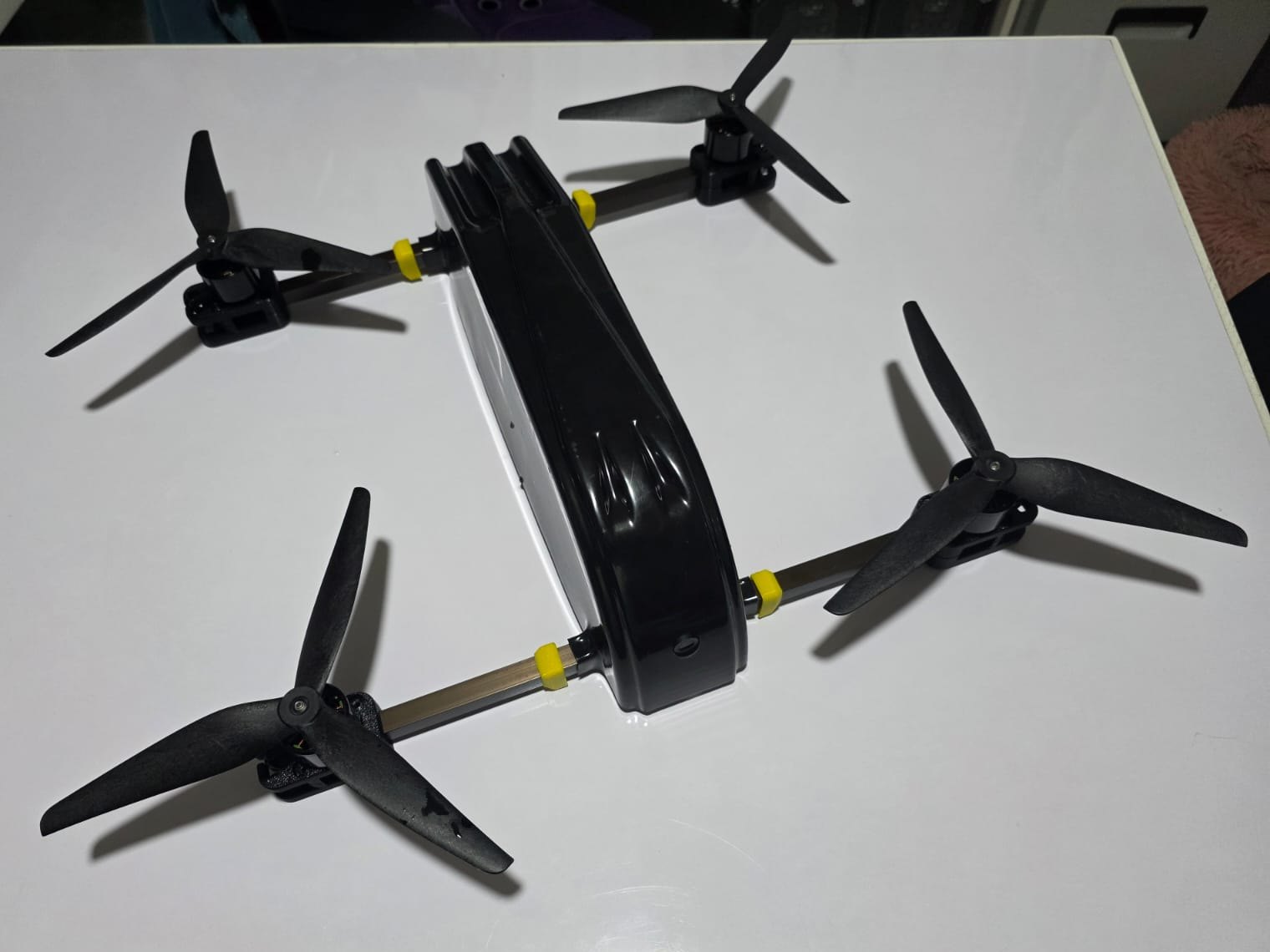 Quadcopter built on the Universal Drone Platform with a moulded hull and three-blade propellers